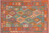 5x7 hand woven Turkish Kilim wool rug in blue and rust - Chic Gennie Turkish