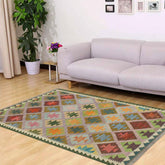 4x5 hand woven Turkish Kilim wool rug in purple and green - Chic Phillips Turkish