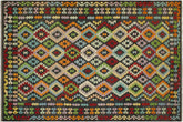7x10 hand woven Turkish Kilim wool rug in charcoal and rust - Rustic Lane Turkish