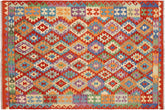 7x10 hand woven Turkish Kilim wool rug in rust and blue - Chic Emanuel Turkish