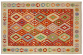 7x10 hand woven Turkish Kilim wool rug in rust and blue - Chic Jeffery Turkish